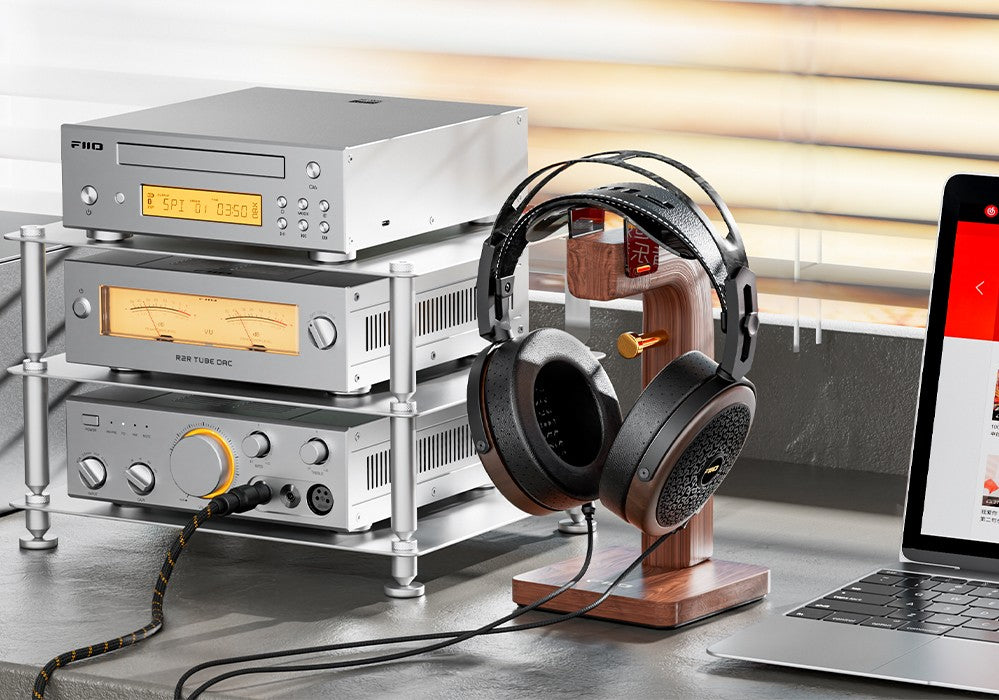 FiiO FT15 headphone shown with optional headphone amp, dac & cd player